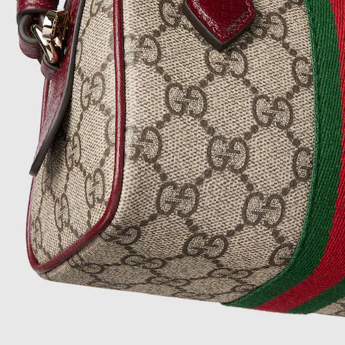 Ophidia mini boston bag