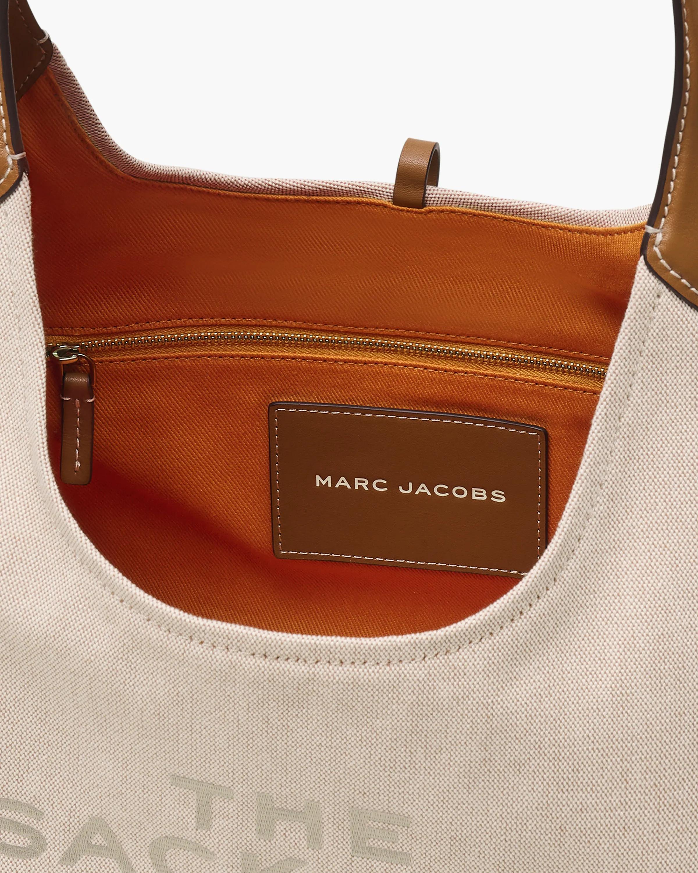 The Leather-Trim Canvas Belted Sack Bag
