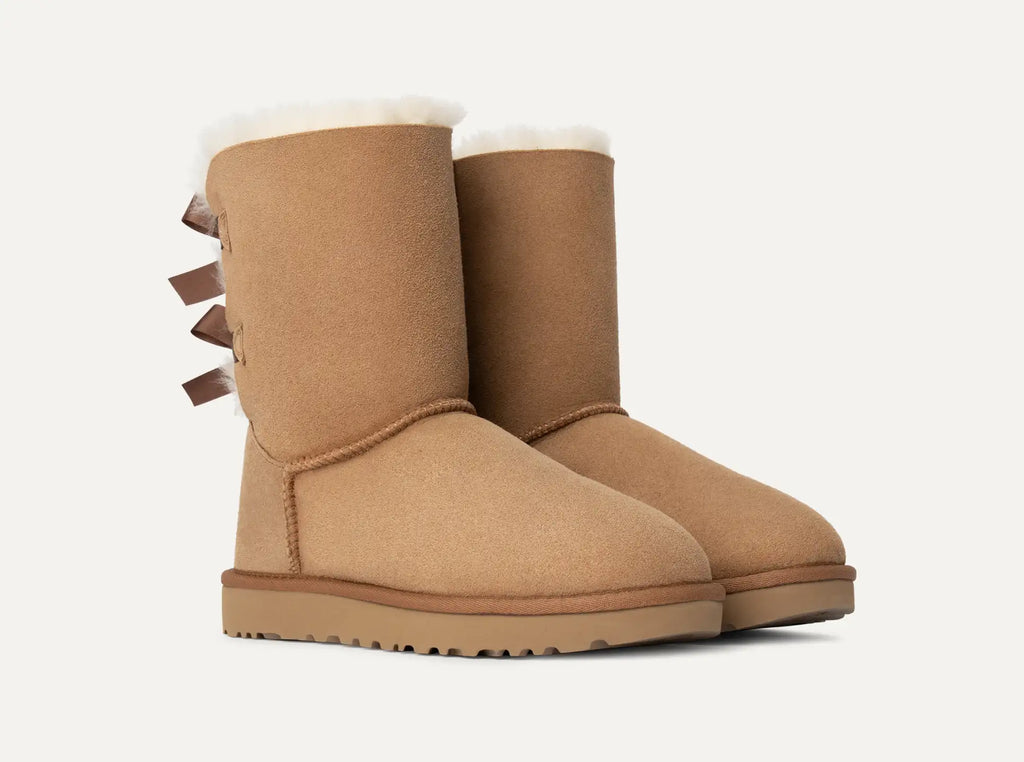 UGG® Bailey Bow Short Boot – Water-Resistant Sheepskin with Feminine Satin Bows