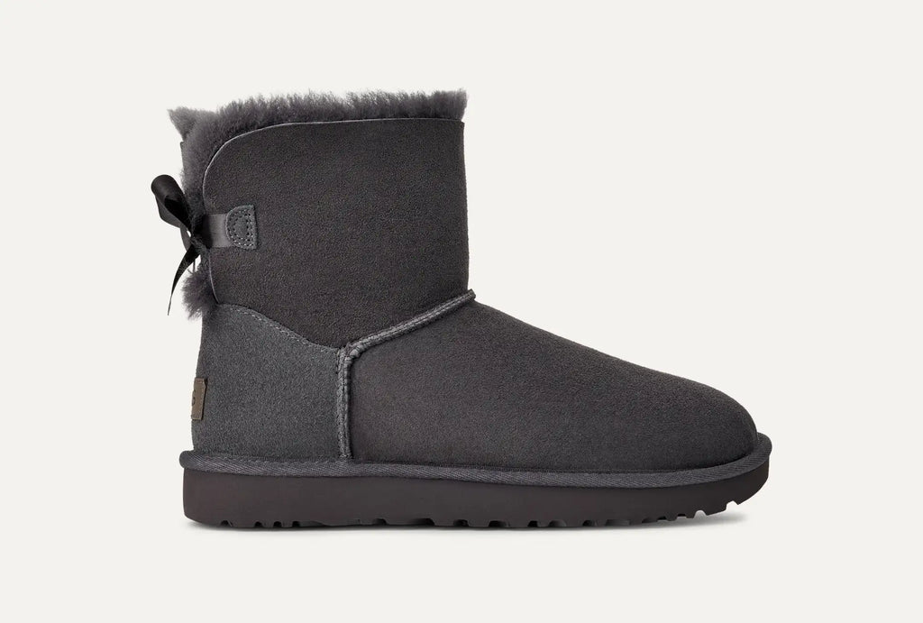 UGG® Mini Bailey Bow II Boot – Water-Resistant Sheepskin with Satin Bow Detail
