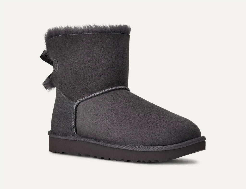 UGG® Mini Bailey Bow II Boot – Water-Resistant Sheepskin with Satin Bow Detail