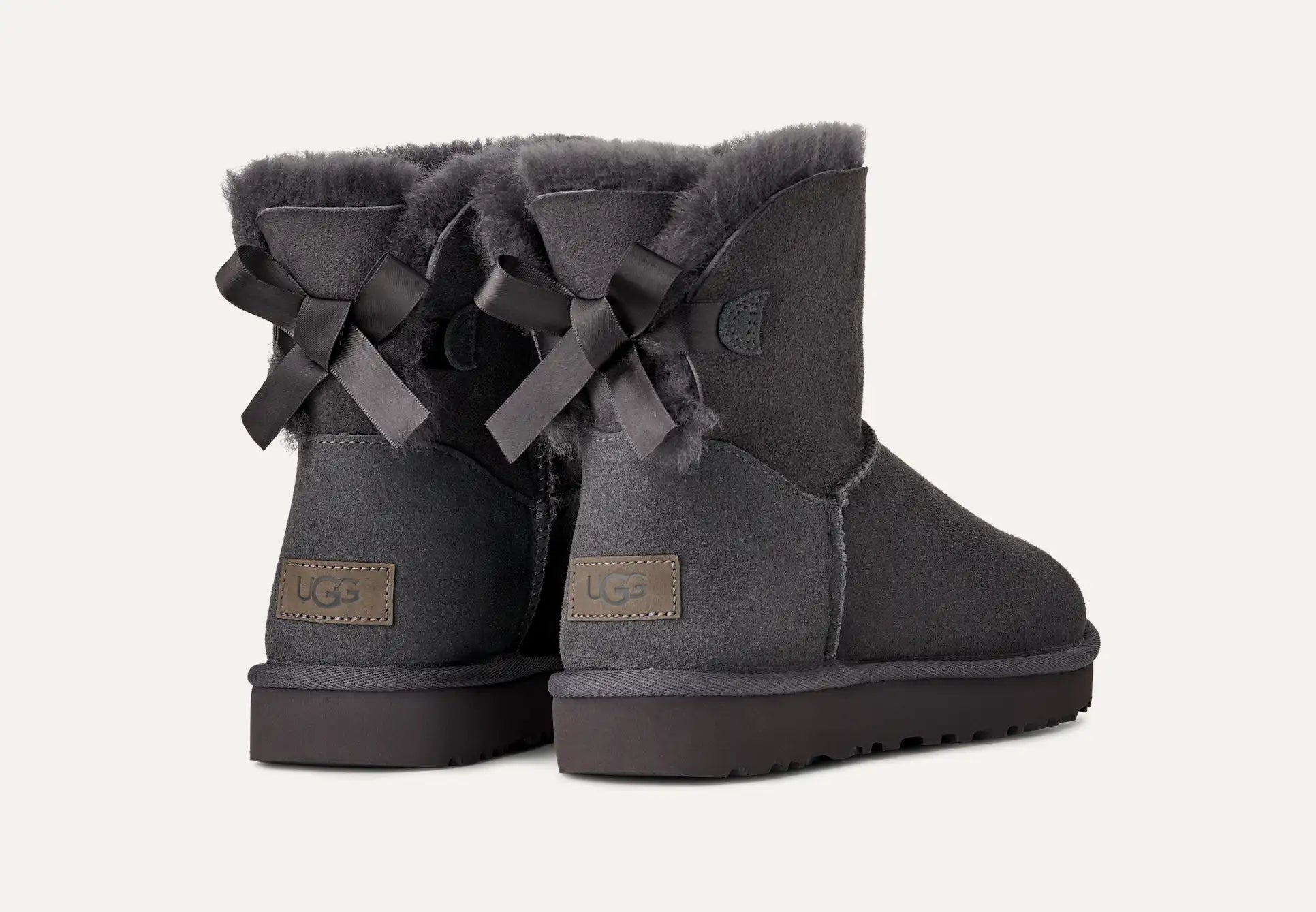 UGG® Mini Bailey Bow II Boot – Water-Resistant Sheepskin with Satin Bow Detail