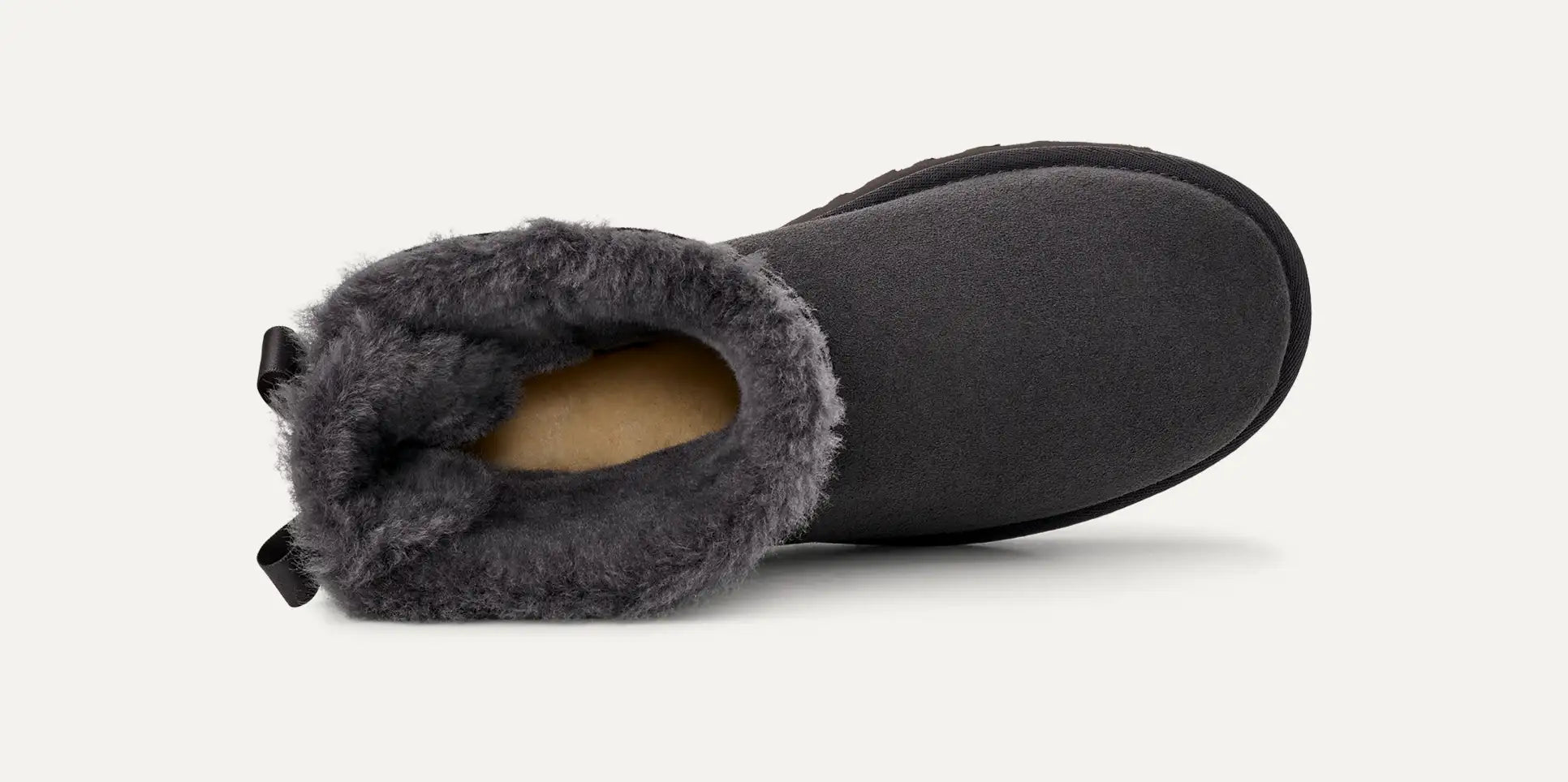 UGG® Mini Bailey Bow II Boot – Water-Resistant Sheepskin with Satin Bow Detail