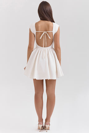 Enchant white open back mini dress