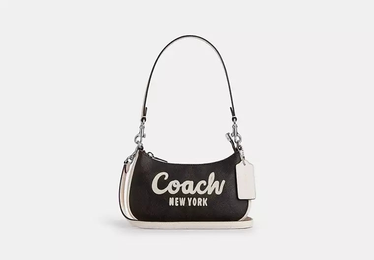 Coach Teri Mini Crossbody Bag In Signature Canvas With Coach Graphic - Bags | Shop From The Mirage