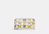 Coach Long Zip Around Wallet With Butterfly Print - Wallets | Shop From The Mirage