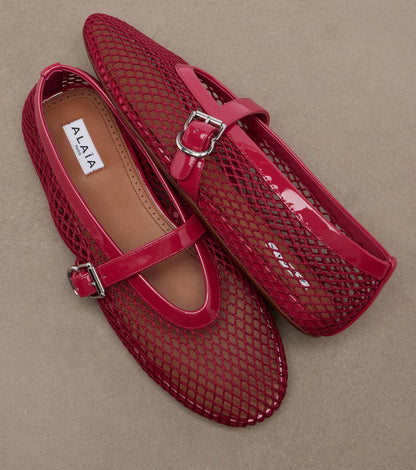 Alaïa Leather-trimmed fishnet Mary Jane flats