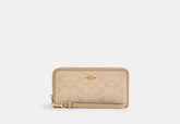 Coach Long Zip Around Wallet With Signature Canvas - Wallets | Shop From The Mirage