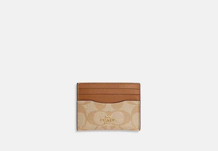 Coach Slim Id Card Case In Signature Canvas - Wallets | Shop From The Mirage