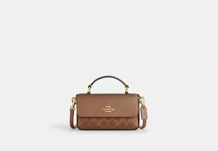 Mini Josie Top Handle Bag In Signature Canvas