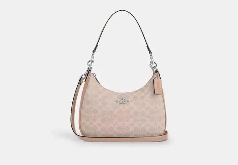 Coach Teri Hobo Bag In Signature Canvas - Bags | Shop From The Mirage