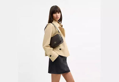 Mini Carey Crossbody Bag In Signature Canvas