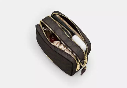 Mini Carey Crossbody Bag In Signature Canvas