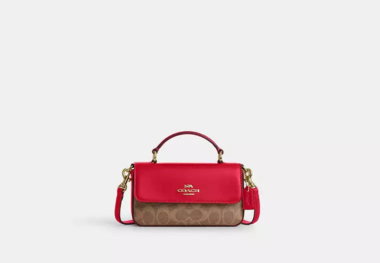 Mini Josie Top Handle Bag In Signature Canvas