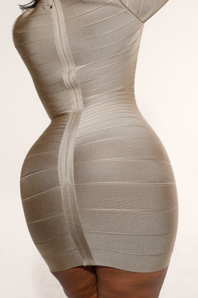 The OG taupe long sleeve bandage mini dress