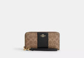 Coach Long Zip Around Wallet In Signature Canvas With Stripe - Wallets | Shop From The Mirage