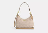 Coach Teri Hobo Bag In Blocked Signature Canvas - Bags | Shop From The Mirage