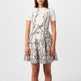 Cream Dress With Decorative Pattern