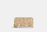 Coach Long Zip Around Wallet In Signature Canvas With Floral Print - Wallets | Shop From The Mirage