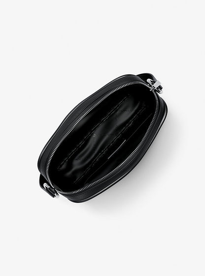 Jet Set Travel Large Logo Debossed Camera Crossbody Bag