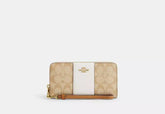 Coach Long Zip Around Wallet In Signature Canvas With Stripe - Wallets | Shop From The Mirage