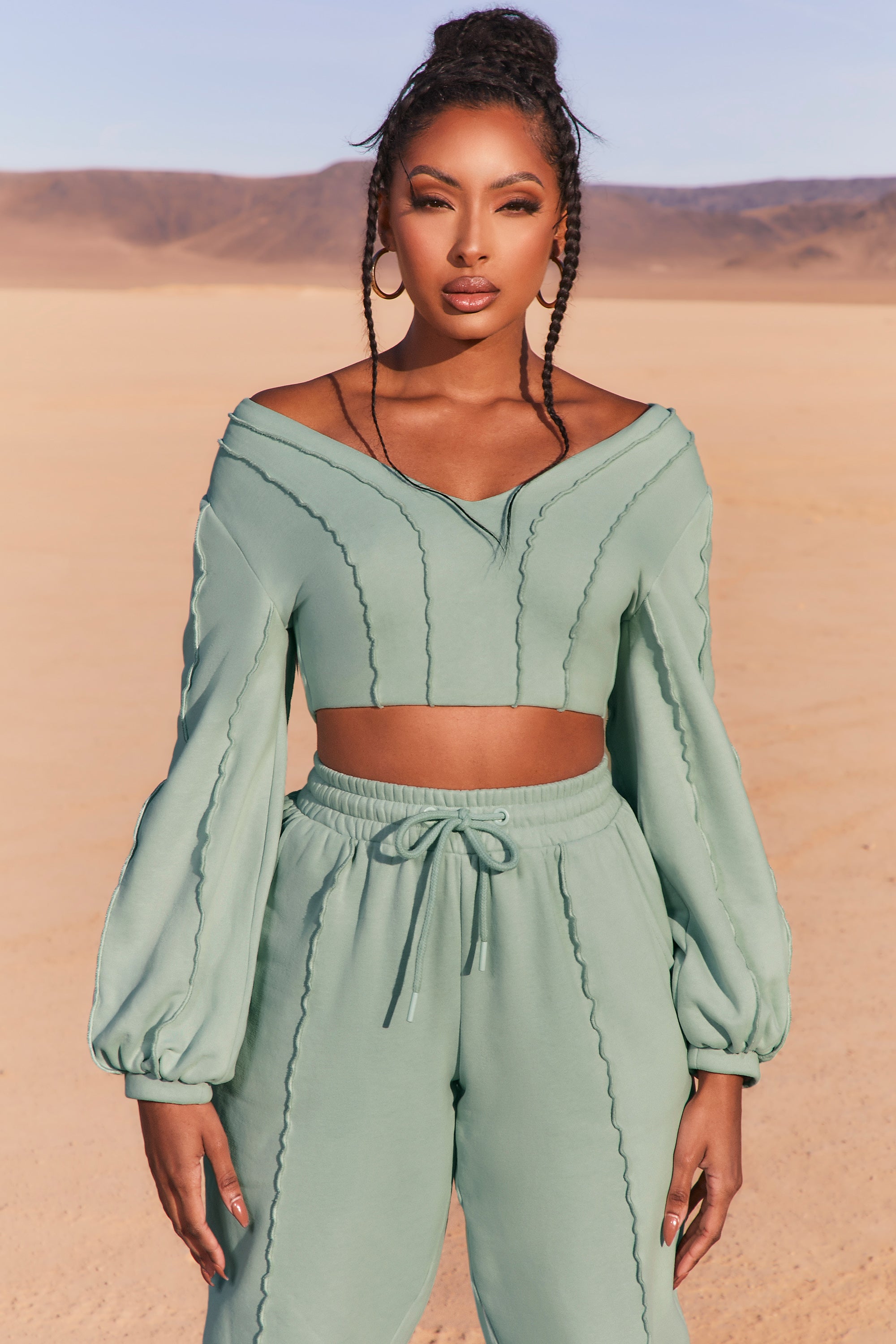 Uncovered Exposed Seam Bardot Crop Top in Blue