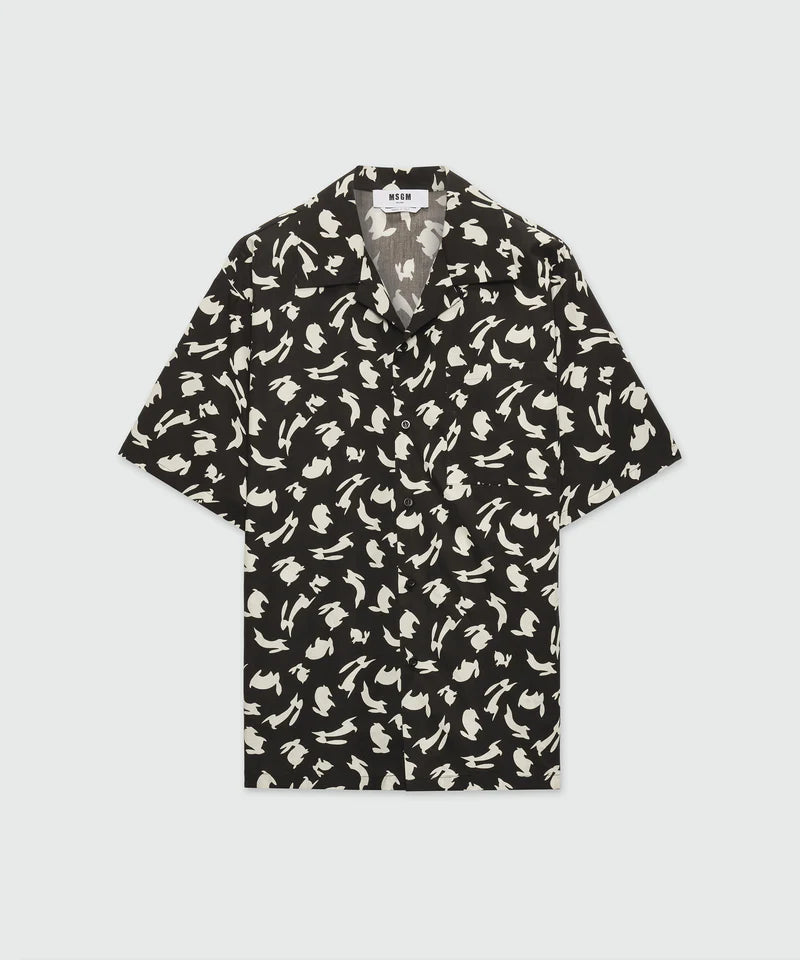 Black poplin bowling shirt with Follow the Rabbit print, short-sleeved, oversized fit, featuring a chest pocket.