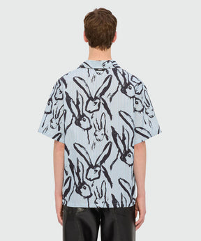 Back view of light blue striped poplin bowling shirt with Sketched Bunnies print, featuring a relaxed fit.