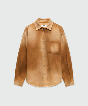 Beige spray-effect denim shirt with classic collar, button closure, chest pocket, and oversized fit.