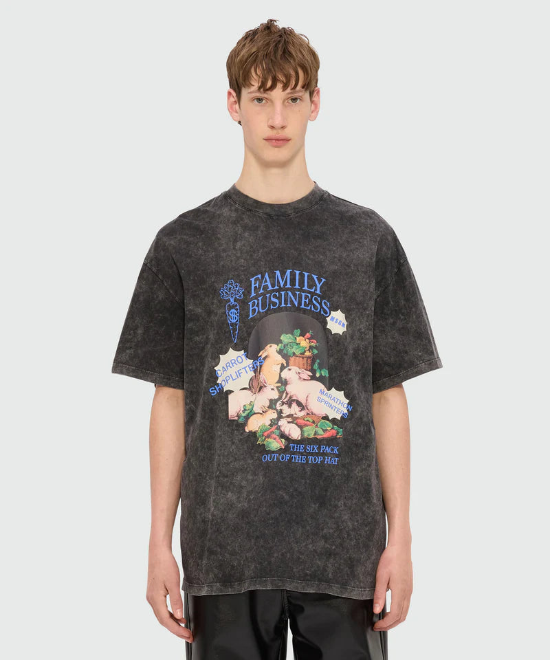 Black marbled jersey T-shirt with oversized fit and multicolored 'Family Business' graphic on front.