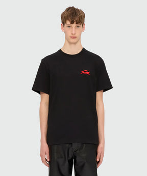 Black jersey T-shirt with 3D Follow the Rabbit embroidery worn by a model in size M.