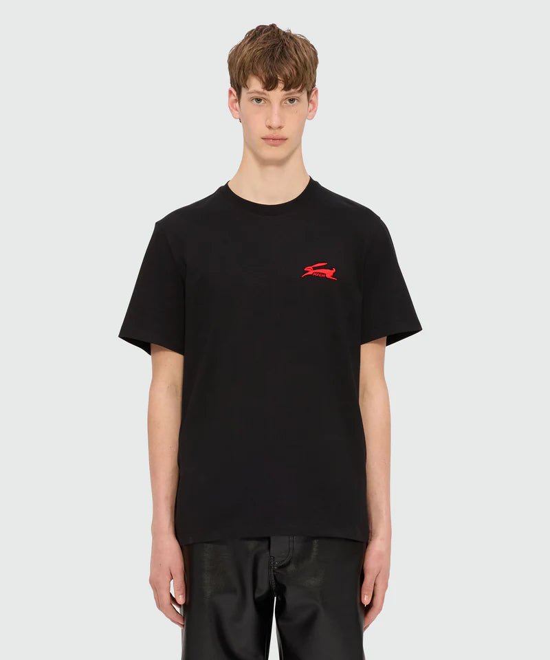 Black jersey T-shirt with 3D Follow the Rabbit embroidery worn by a model in size M.