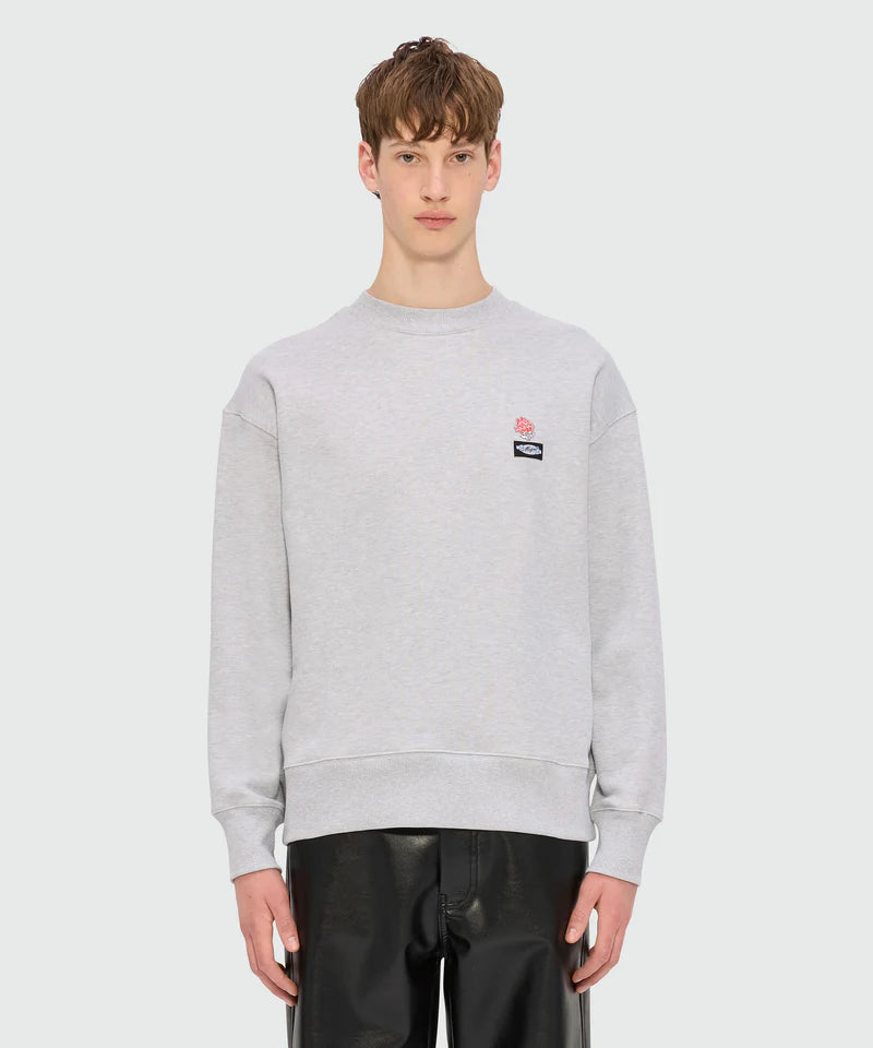 Grey melange jersey sweatshirt with MSGM Roses patch on chest, crewneck style, regular fit, model wearing size M/48.