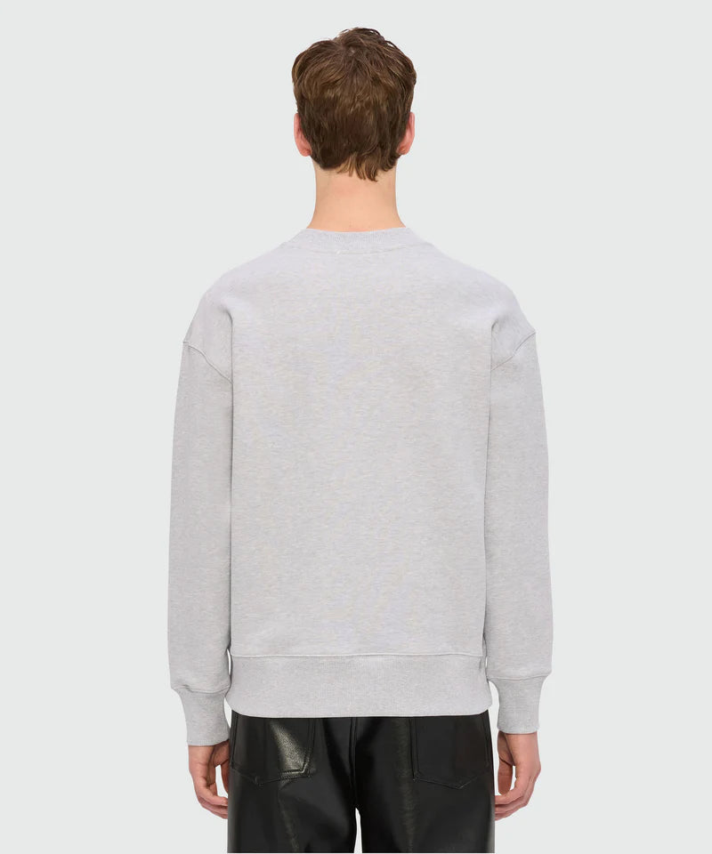 Back view of grey melange jersey sweatshirt with MSGM patch, showcasing ribbed cuffs and regular fit.