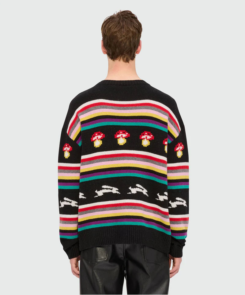 Back view of multicolor jacquard sweater featuring mushrooms and rabbits, crew-neck oversized fit in wool blend.