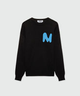 Black cashmere blend crew-neck sweater with contrasting blue 'TheMwave' patch on chest
