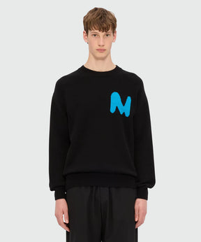 Black cashmere blend sweater with contrasting TheMwave patch, ribbed collar, cuffs, and hem, regular fit.
