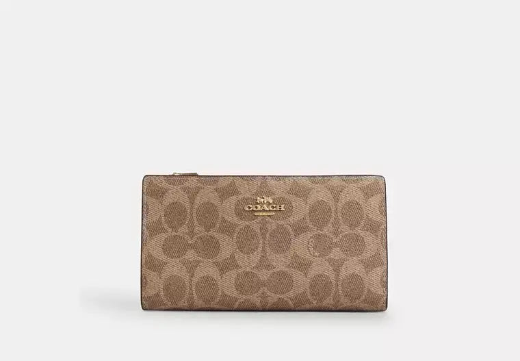 Coach Slim Zip Wallet In Signature Canvas - Wallets | Shop From The Mirage