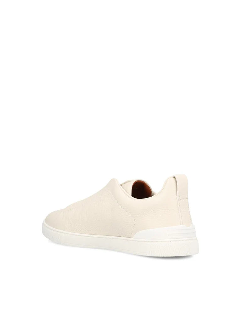 Zegna Men’s Triple Stitch™ White Deerskin Slip-On Sneakers – Made in Italy | Iconic Luxury Footwear