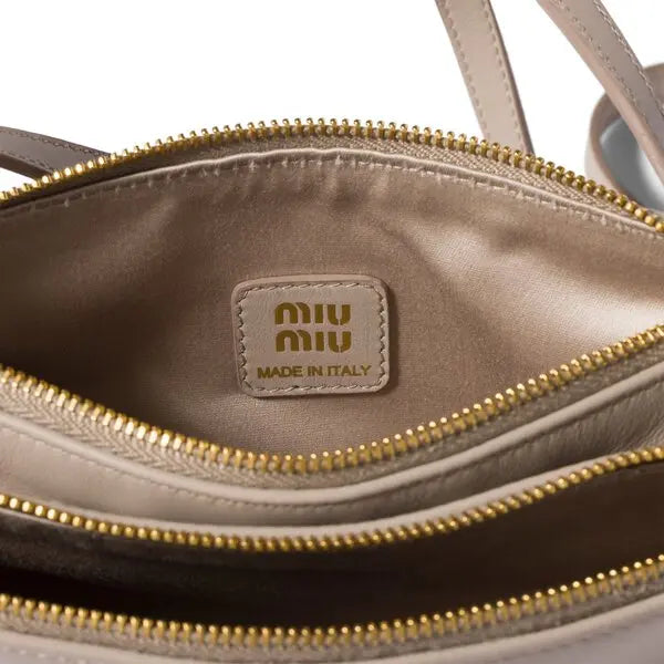 Miu Miu  leather pouch with embossed logo