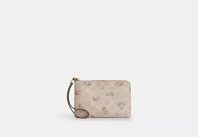 Coach Corner Zip Wristlet In Signature Canvas With Floral Print - Wallets | Shop From The Mirage