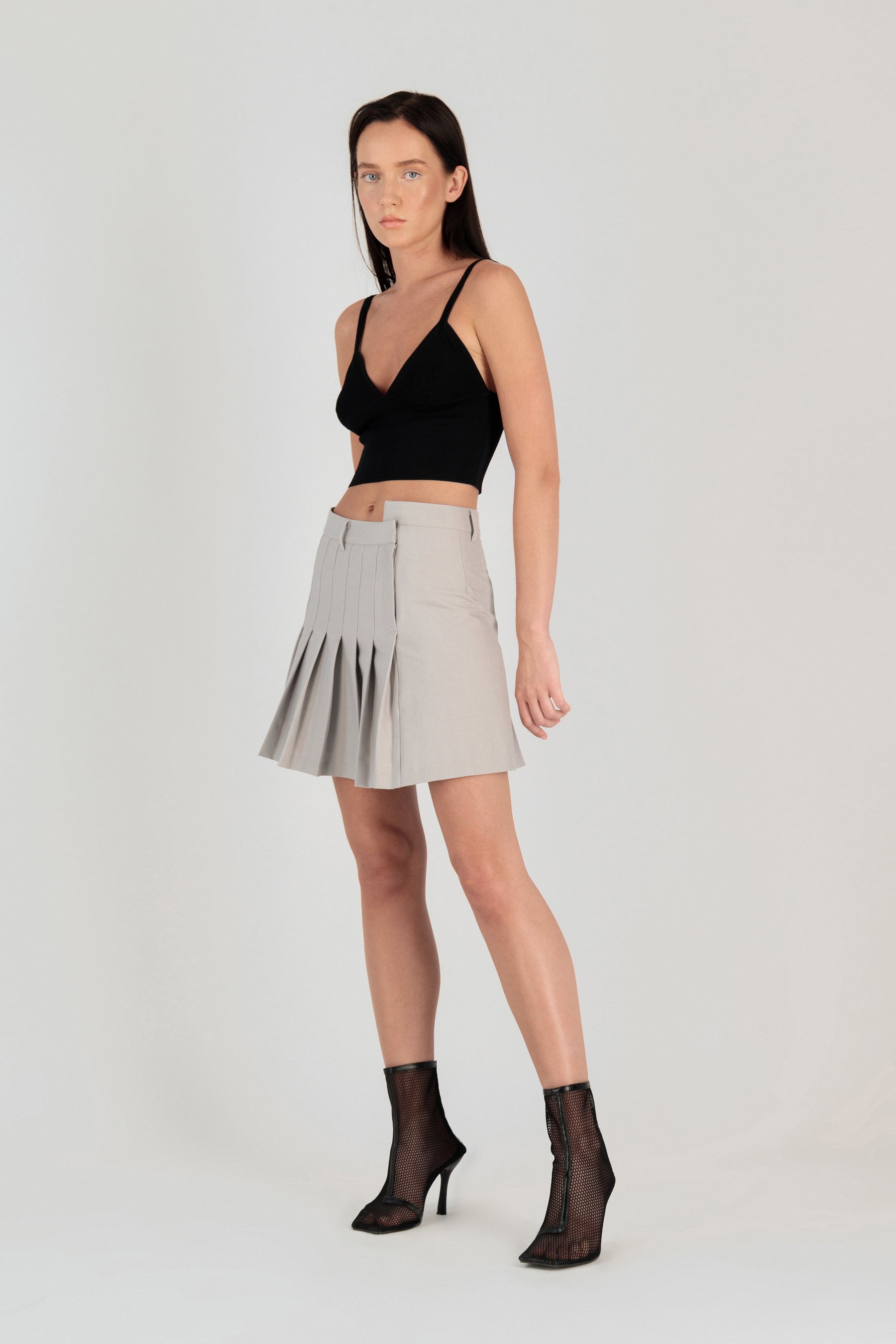 HALF PLEATED MINI SKIRT