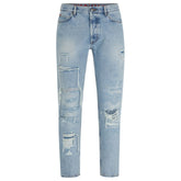 tapered-fit jeans in blue denim with destroyed details