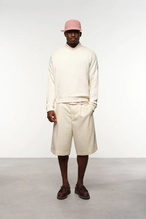 Loose knit rolled crewneck