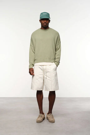 Loose knit rolled crewneck