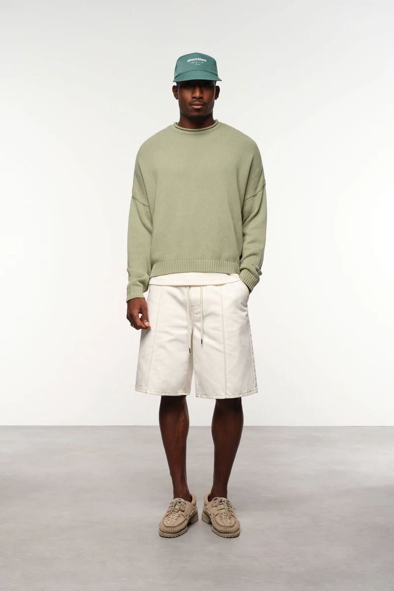 Loose knit rolled crewneck