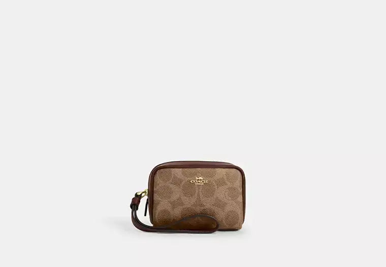 Coach Pouch Wristlet In Signature Canvas - Bags | Shop From The Mirage