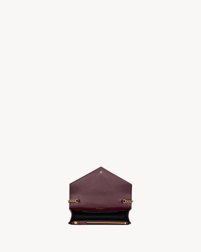 CASSANDRE envelope chain wallet in GRAIN DE POUDRE leather