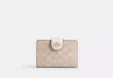 Coach Medium Corner Zip Wallet In Signature Canvas - Wallets | Shop From The Mirage