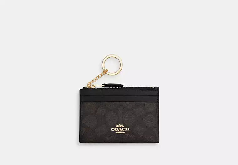 Coach Mini Skinny Id Case In Signature Canvas - Wallets | Shop From The Mirage